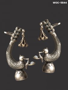 Silver lookalike bird earcuffs